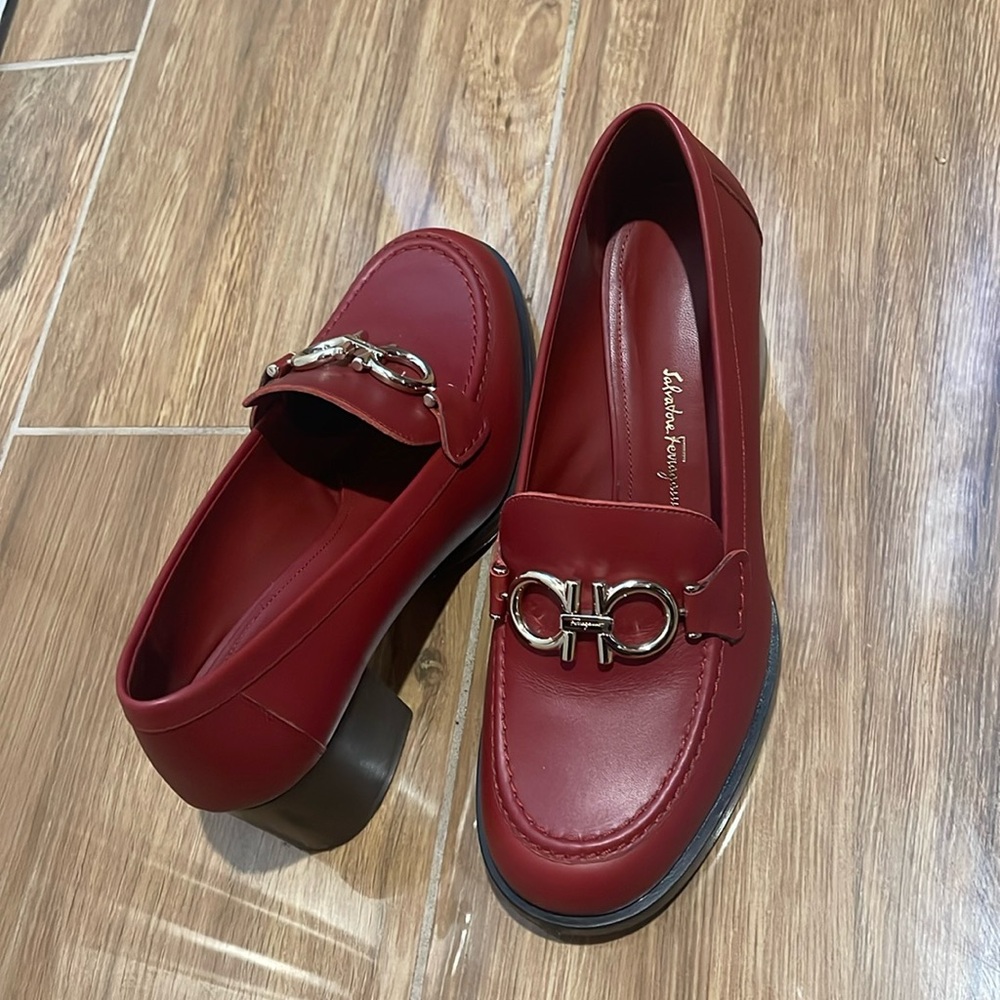 Ferragamo loafers in red. It says size 7 but they feel slightly bigger.